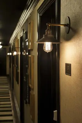 a light fixture hanging from a hallway in a room at Shepley South Beach Hotel in Miami Beach