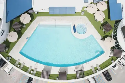 an overhead view of a swimming pool on a cruise ship at Nuvo Suites Hotel - Miami Doral in Miami