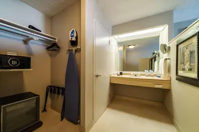 a bathroom with a sink and a mirror at Hyatt Regency Miami in Miami
