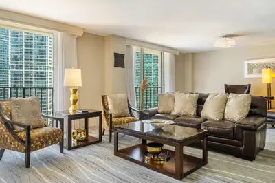 a living room with a couch and chairs at Hyatt Regency Miami in Miami