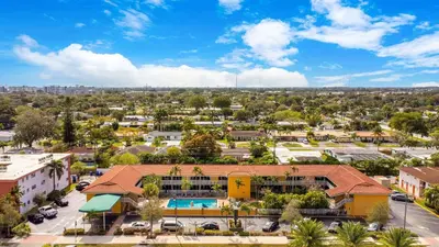 an aerial view of a small town with a building at Quality Inn & Suites Airport-Cruise Port Hollywood in Hollywood