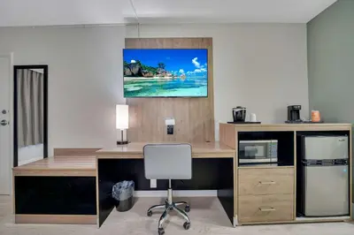 an office with a desk and a chair at Quality Inn & Suites Airport-Cruise Port Hollywood in Hollywood
