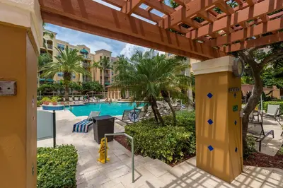 a view of a pool at a resort at Yacht Club at Aventura Luxurious 1 Bed 1 Bath in Aventura