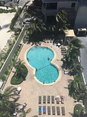 an overhead view of a swimming pool at a resort at Hollywood apartment by the sea in Hollywood