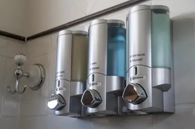 a row of water tanks in a bathroom at Suite Love in Miami Beach