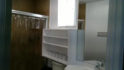 a bathroom with a sink and a mirror at Fatimataj Mahal in Miami