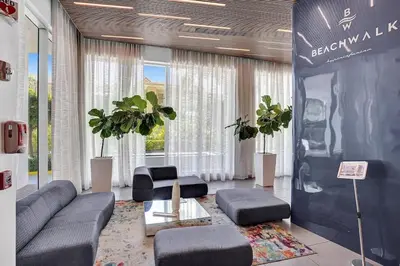 a living room with a couch and chairs and a table at Modern Penthouse condo with 2 Large private terraces in Hollywood