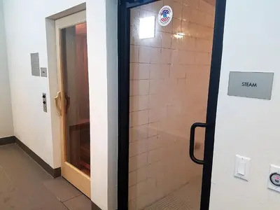 a door in a hallway with a sign on it at Downtown Miami Deluxe Apartment in Miami