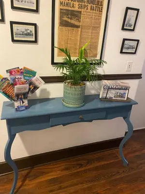 a blue table with a potted plant on it at Hotel Ponce de Leon in Miami