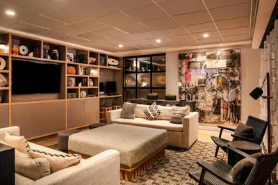 a living room filled with furniture and a flat screen tv at Residence Inn by Marriott Miami Aventura Mall in Aventura