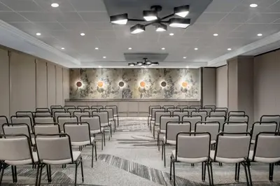 a room with rows of chairs and a screen at Residence Inn by Marriott Miami Aventura Mall in Aventura