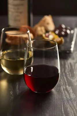 two glasses of wine sitting on a table at Hyatt Place Fort Lauderdale Airport/Cruise Port in Dania Beach