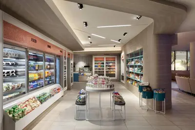 a store interior with a bakery with shoes on display at Miami Airport Marriott in Miami