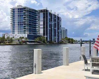 a view of a large building next to a body of water at Holiday Isle Yacht Club in Fort Lauderdale