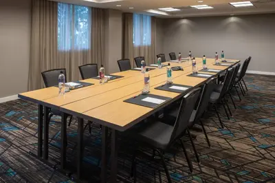 a large conference room with a long table and chairs at Residence Inn by Marriott Miami Airport in Miami