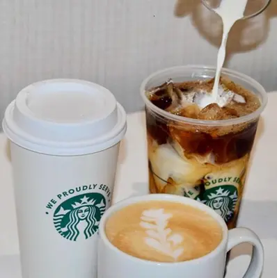 two cups of coffee sitting on a table at Courtyard Miami Downtown Brickell Area in Miami