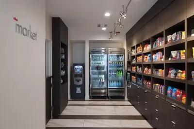 a grocery store aisle with a soda vending machine at Courtyard Miami Coral Gables in Miami