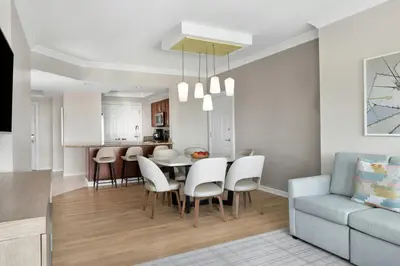 a kitchen and dining room with a table and chairs at Marriott's BeachPlace Towers in Fort Lauderdale