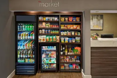 a refrigerator filled with lots of food and drinks at Residence Inn by Marriott Fort Lauderdale Weston in Weston