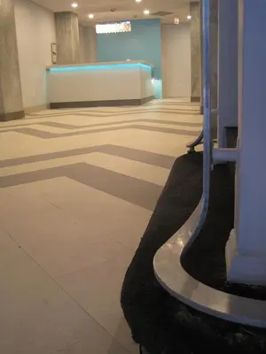 an empty room with a tile floor and a wall at Miami Sun Hotel - Downtown/Port of Miami in Miami