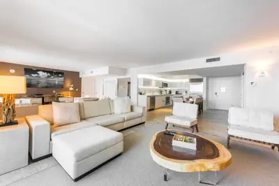 a living room with a couch and a table at Oceanview Private Condo at 1 Hotel & Homes -1040 in Miami Beach