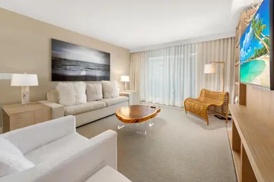 a living room with a couch and a table at Oceanview Private Condo at 1 Hotel & Homes -1211 in Miami Beach