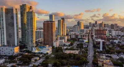 an aerial view of a city with tall buildings at Up Midtown in Miami