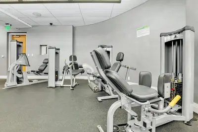 a fitness room with treadmills and cardio machines at 2 BEDROOMS 2 FULL BATHROOMS APT. ON THE BEACH in Hollywood