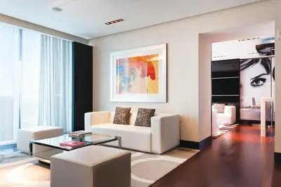 a living room with a couch and a table at Hotel Beaux Arts, Autograph Collection in Miami