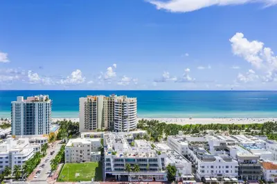 an aerial view of a city and the beach at Penthouse De Soleil South Beach - on Ocean Drive Miami Beach in Miami Beach
