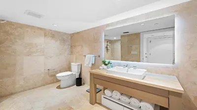 a bathroom with a sink and a toilet at Oceanview Private Condo at 1 Hotel & Homes -904 in Miami Beach