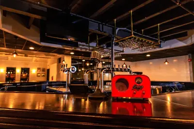 a red appliance sitting on top of a counter at enVision Hotel Miami International Airport in Miami