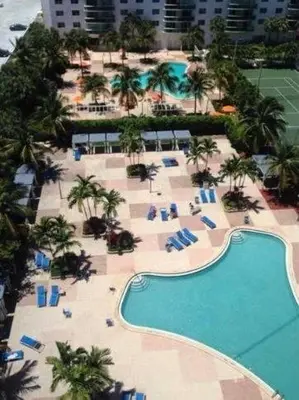 an aerial view of a resort with a swimming pool at Sunny Isles Ocean Reserve Superb Condo Apartments in Miami Beach