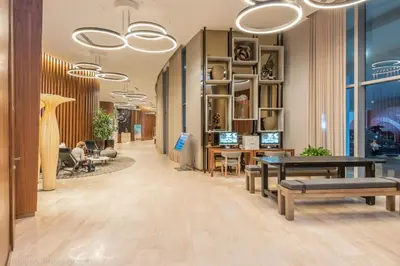 a lobby of a store with benches and tables at 2 Bedroom on 17th floor on the beach Resort in Hallandale Beach