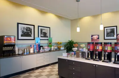a store with a counter with many bottles of wine at Hampton Inn & Suites by Hilton Miami Downtown/Brickell in Miami