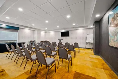 a room with a bunch of chairs in it at Hampton Inn Weston Fort Lauderdale in Weston