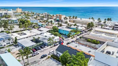 an aerial view of a city with the ocean at Modern Loft wBed Steps from Beach Boardwalk in Hollywood