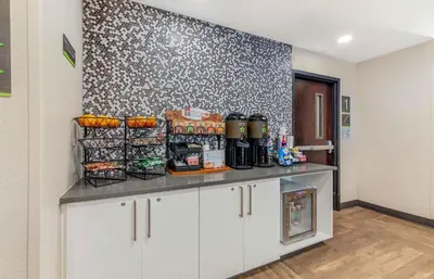 a kitchen with a counter with food on it at Extended Stay America Premier Suites - Miami - Airport - Doral - 87th Avenue South in Miami