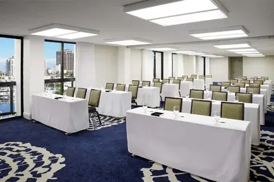a conference room with white tables and chairs at Bahia Mar Fort Lauderdale Beach - DoubleTree by Hilton in Fort Lauderdale