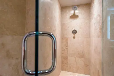 a shower with a glass door in a bathroom at Oceanview Private Condo at 1 Hotel & Homes -906 in Miami Beach