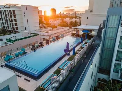 an overhead view of a pool on the rooftop of a hotel at The Fairwind Hotel in Miami Beach