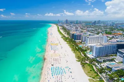 an aerial view of a beach and the ocean at 2 Bedroom Ocean Drive Newly Renovated in Miami Beach