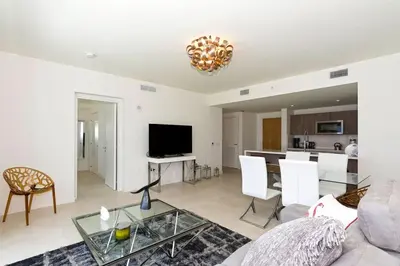 a living room with a couch and a table at Departamento en Tiffany House Fort Lauderdale beach Miami in Fort Lauderdale