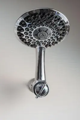 a silver toothbrush holder on a white background at Sun Beach Inn in Hollywood