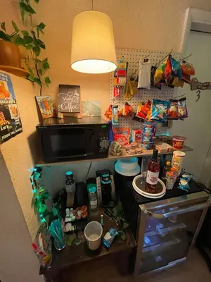 a cluttered kitchen with a counter with food on it at Habitación Céntrica calle 8 Miami in Miami