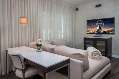 a living room with a couch and a table at The Marlin Hotel in Miami Beach