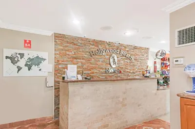 a brick wall with a bar in a room at Paradise Oceanfront by HBH in Hollywood