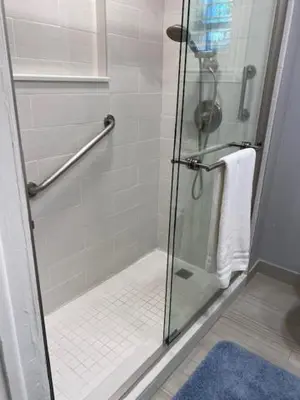 a shower with a glass door in a bathroom at Modern 2/1 Apt near Midtown and Beaches in Miami