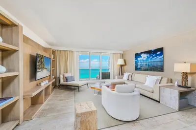 a living room with a white couch and a table at Oceanview Private Condo at 1 Hotel & Homes -1544 in Miami Beach