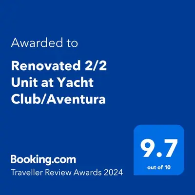 a blue screen with the text awarded to reviewed unit at york clubanu at Renovated 2/2 Unit at Yacht Club/Aventura in Aventura